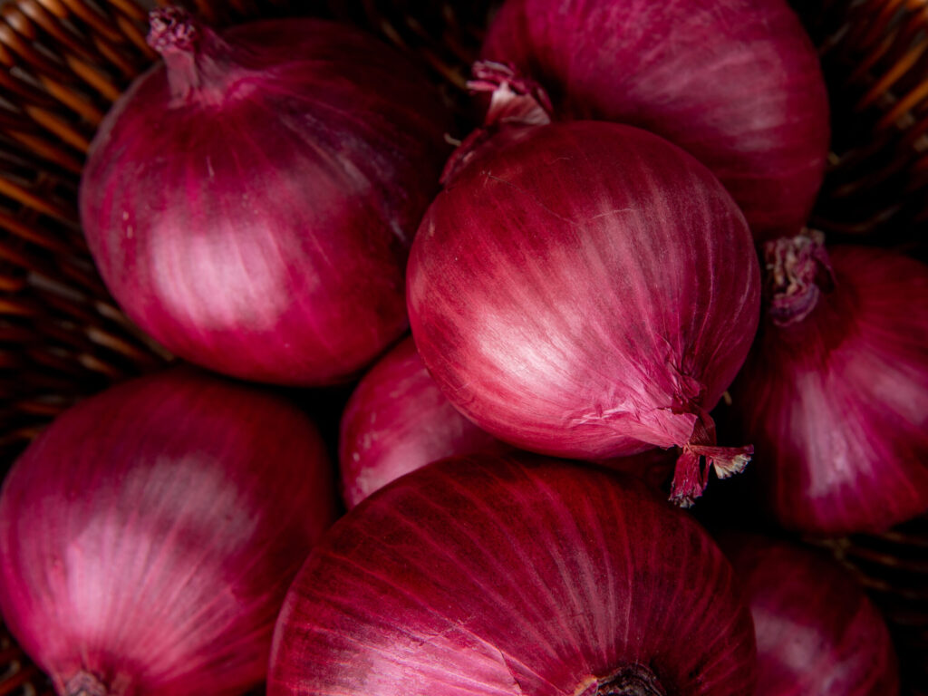Vegetables close up view basket red onions scaled 1